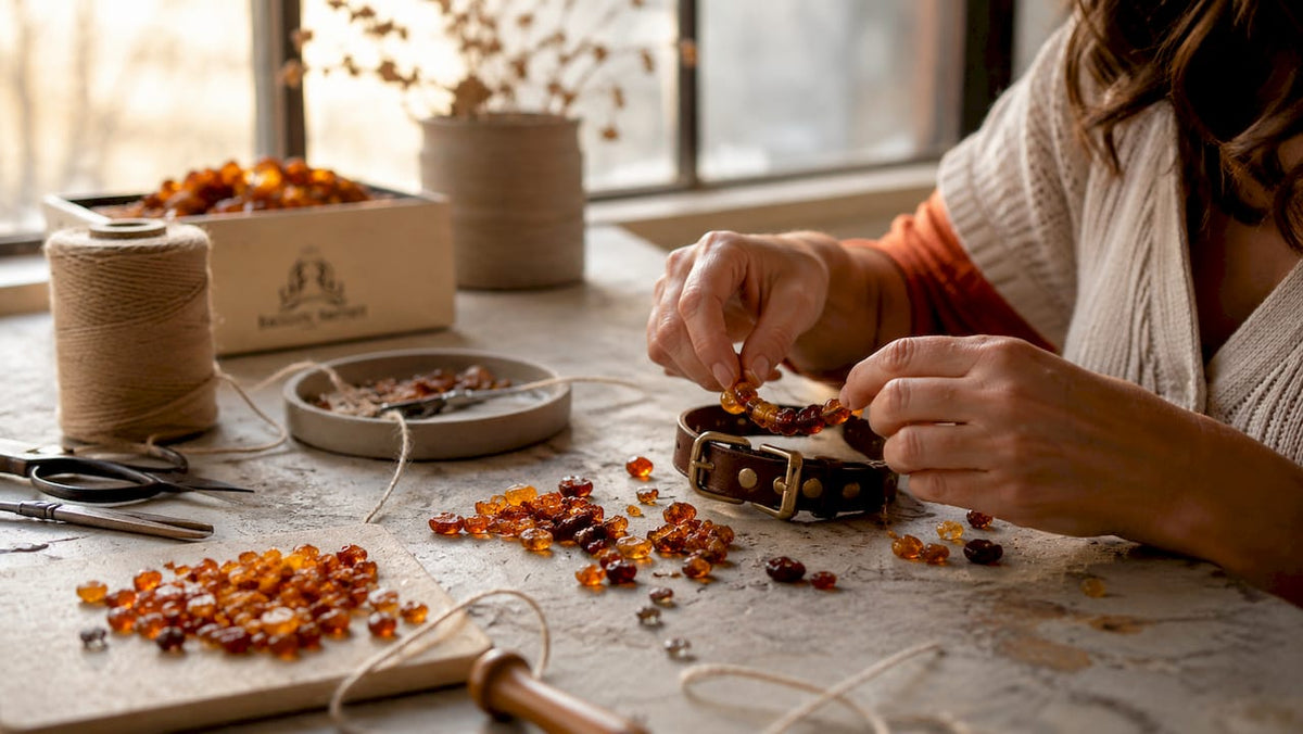 Hands crafting amber pet accessory