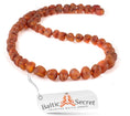 Load image into Gallery viewer, AMBER NECKLACE & BRACELET COGNAC BEADS - FOR A DECIDEDLY UNIQUE STYLE - Baltic Secret

